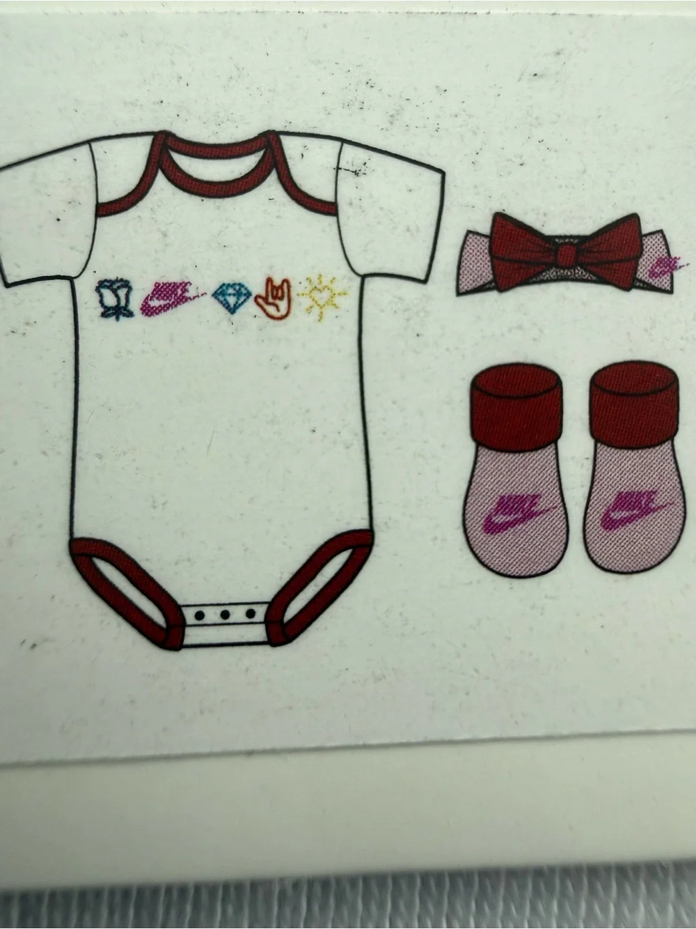 New girls Nike Baby 3-Piece Set in White and Red with Multicolor Icons